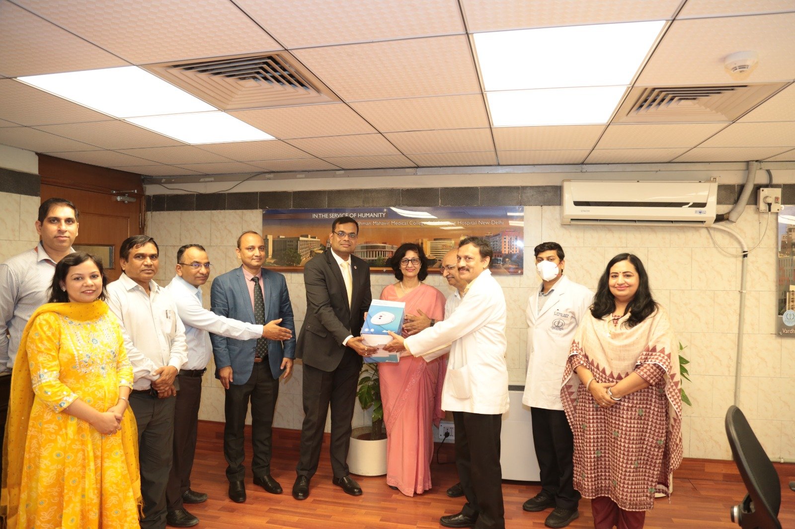 Bank of Baroda's CSR initiative brought nebulizers, water coolers, a smart TV, and a microwave oven to Safdarjung Hospital, Delhi, to elevate patient care.